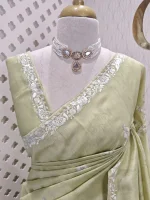 Semi Tussar Saree with floral embroidery, zari-patterned body, and minimal floral vine border - Image 5