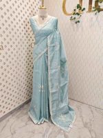 Semi Tussar Saree with floral embroidery, zari-patterned body, and minimal floral vine border - Image 3