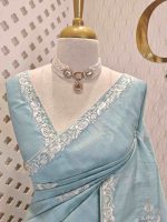Semi Tussar Saree with floral embroidery, zari-patterned body, and minimal floral vine border - Image 2