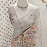 Tissue with hibiscus garden like  embroidery pattern