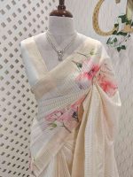 Kerala saree with large hibiscus print all over the body and pallu