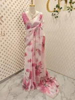 Georgette saree with scattered floral motifs on body decorated with sticky stones and scalloped boarder - Image 15