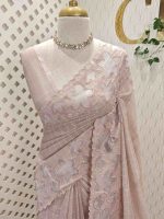 Net kota with grid pattern on body part and boarder with floral shaped applique work and scallop - Image 10
