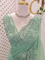 Net with floral beadwork and sequin-embellished scalloped border