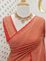 Soft katan with body features floral pattern enclosed within geometric diamond shapes. and a decorative zari border with repetitive linear and floral elements - Image 8