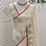 Soft silk with a plain body and foliage -inspired zari-woven border