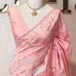Semi tussar with cow and floral applique work on boarder