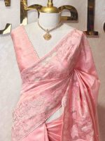 Semi tussar with cow and floral applique work on boarder