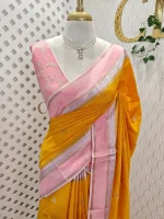 Viscose with contrast border and small zari checks and buttas on the body