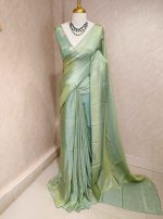 Tissue silk saree with plain body and elegant leaf motifs blouse - Image 6