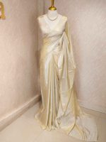 Tissue silk saree with plain body and elegant leaf motifs blouse - Image 12
