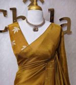 Tissue silk saree with plain body and elegant leaf motifs blouse - Image 13