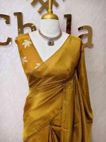 Tissue silk saree with plain body and elegant leaf motifs blouse - Image 14