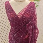 Net saree with sequins and beads vein like line pattern