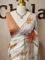 Georgette saree with scattered floral motifs on body decorated with sticky stones and scalloped boarder - Image 4