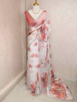 Georgette saree with scattered floral motifs on body decorated with sticky stones and scalloped boarder - Image 9