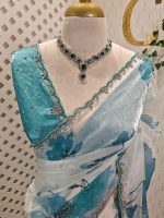 Georgette with large floral motifs on the pallu and body with beads and sequins - Image 2