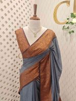 Tissue silk with small check pattern and contrast leaf and flower design on border
