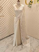 Net kota with grid pattern on body part and boarder with floral shaped applique work and scallop - Image 6