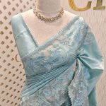 Semi tussar with parrot and floral applique work
