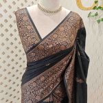 Semi tussar banarasi with simple motifs on the body and with thick boarder